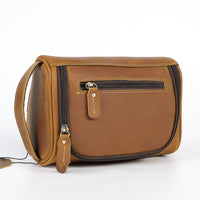 Man holding a retro cowhide bag